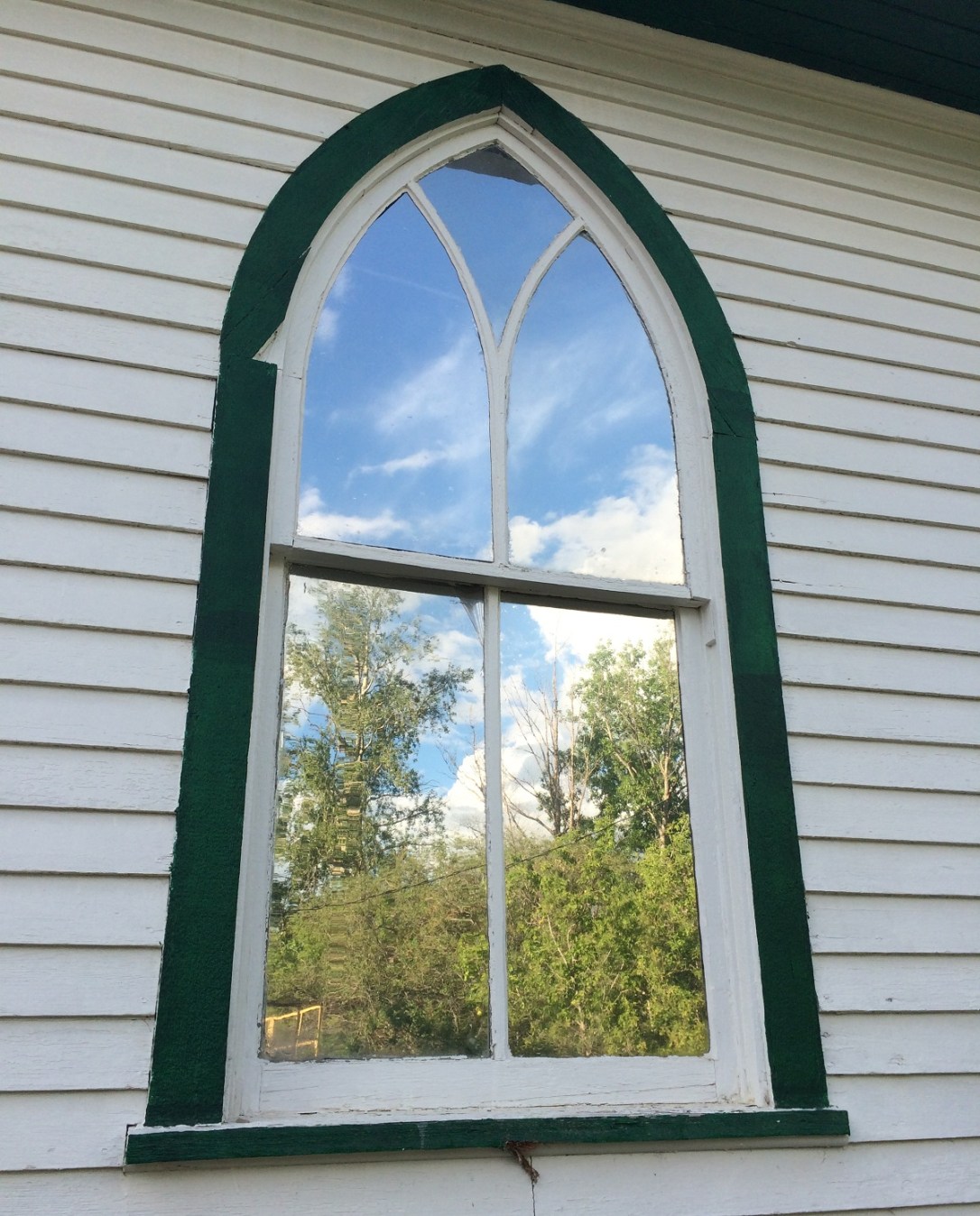 church window with reflection