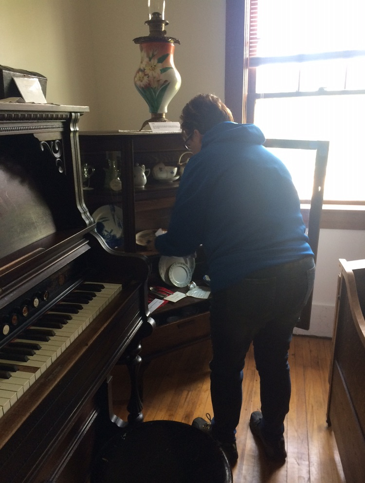 dusting china cabinet