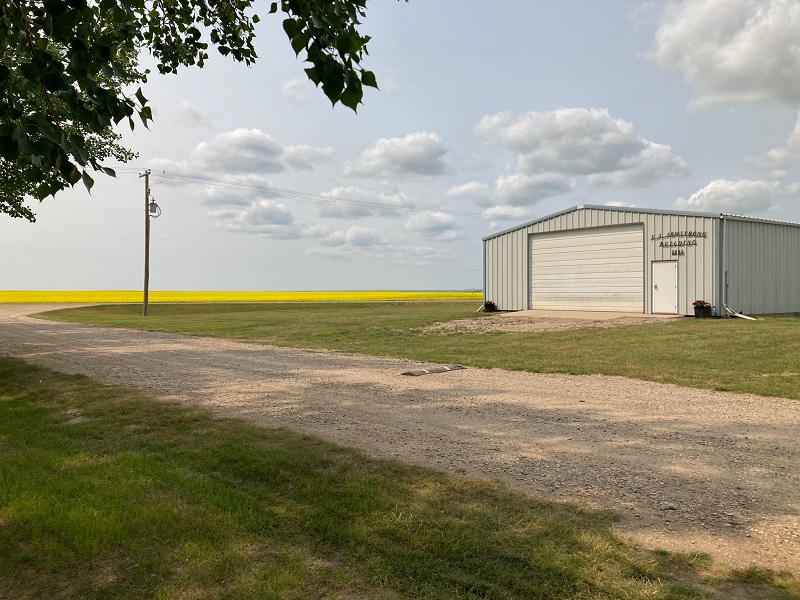 view of canola fields from the Duvall House back porch