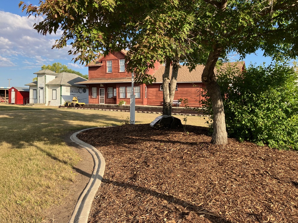Elizabeth McLain Memorial Garden, mulched and trimmed.