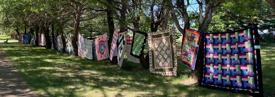 quilt walk along the treed walking path